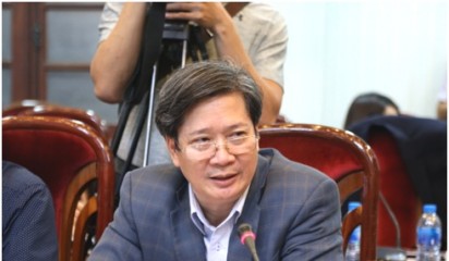 Ông Nguyễn Tá Tỉnh tham gia Giao lưu trực tuyến ""Những điểm mới trong chính sách BHYT từ tháng 12-2018" do BHXH Việt Nam phối hợp với Báo Nhân dân tổ chức.